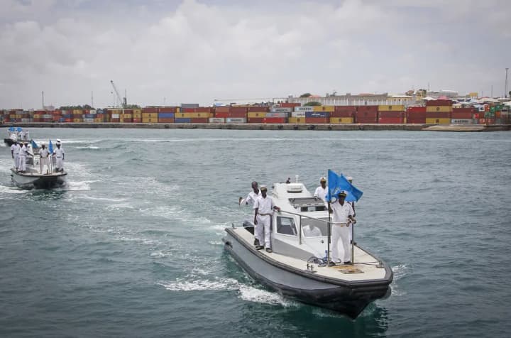 The Turkish Navy and Somali forces freed a ship captured by pirates; 14 attackers were eliminated